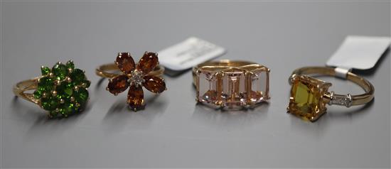 Four 9ct gold gem-set dress rings.